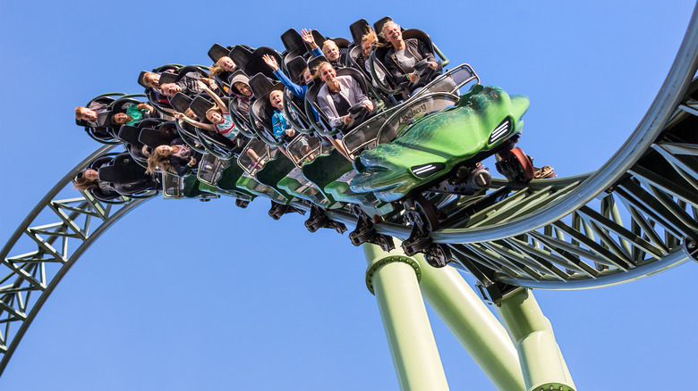 People riding a roller coaster 