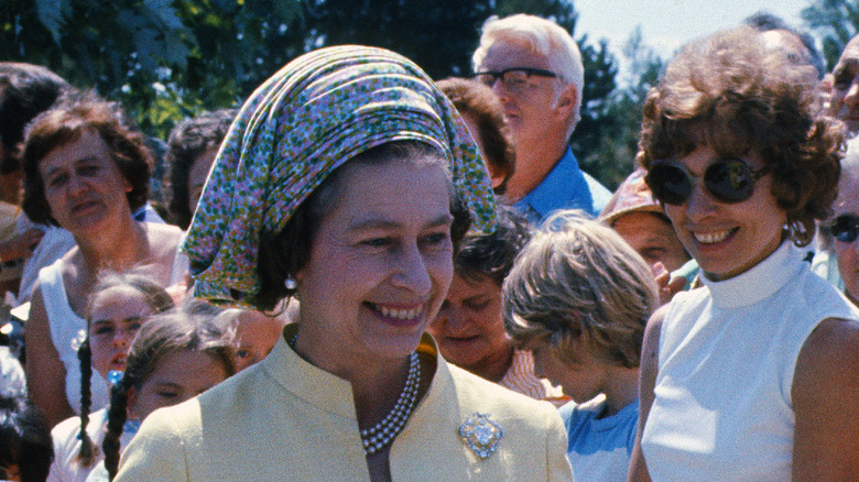 Queen Elizabeth II walks through a crowd in Canada