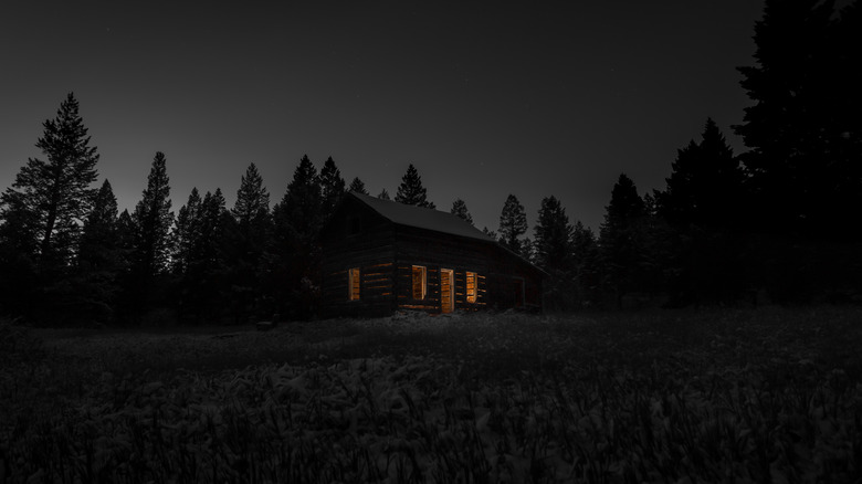 cabin in the woods at winter