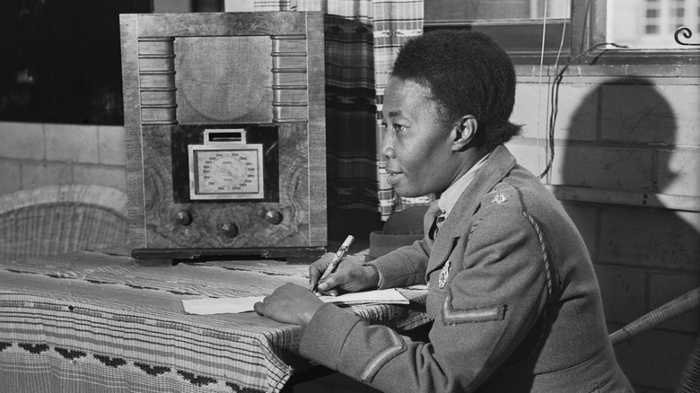 servicewoman listening to the radio