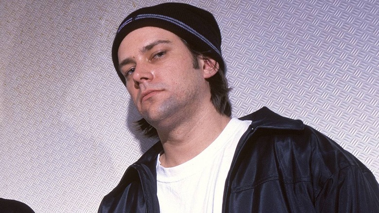 Joel Ekman looking down serious