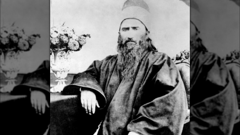 The Baha'u'llah sitting down