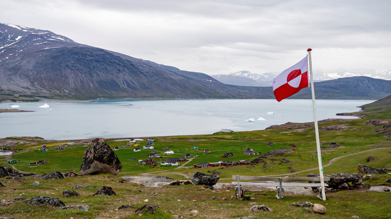 Greenland flag against natural backdrop