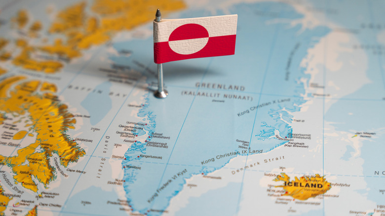 Greenland flag planted on map