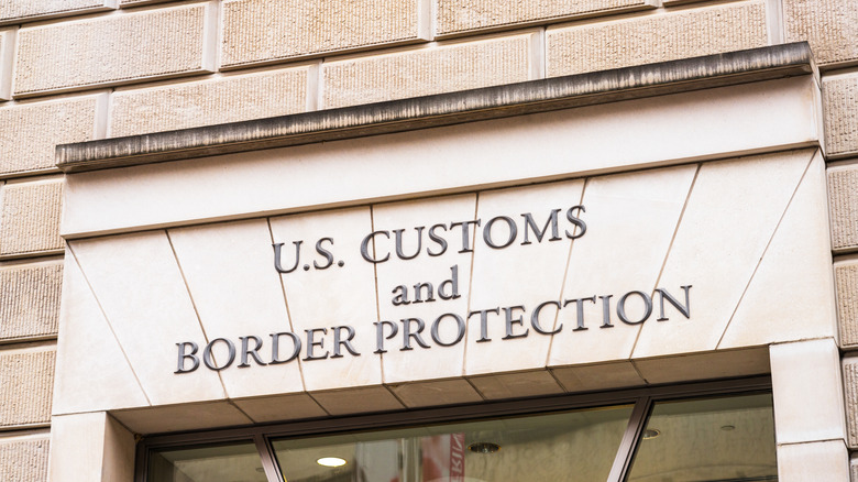 Stone lettering stating U.S. Customs and Border Protection outside ICE building