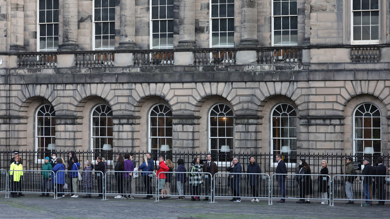 Queue of people paying respects