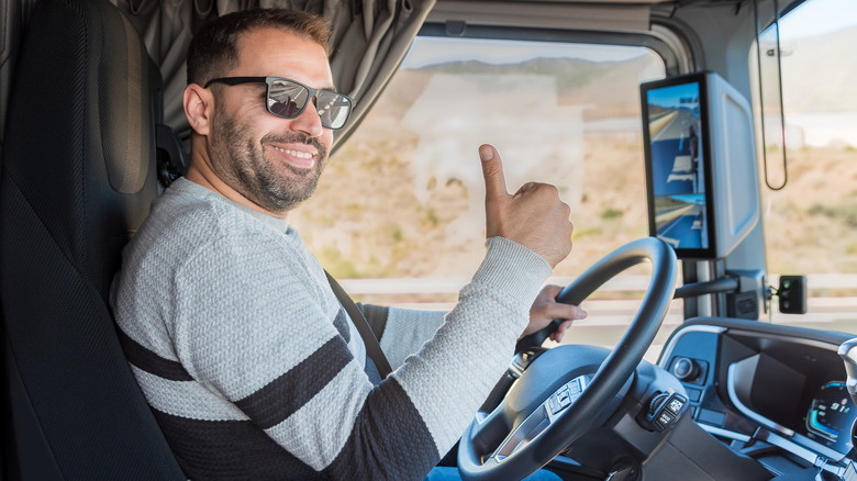 Trucker giving a thumbs up