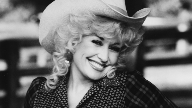 Dolly Parton smiling cowboy hat