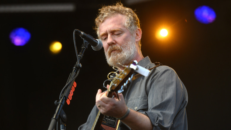 Glen Hansard playing guitar
