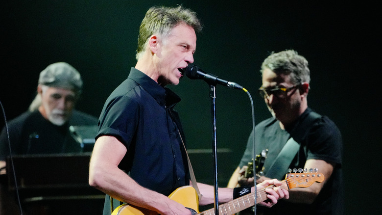 Stone Gossard singing into microphone