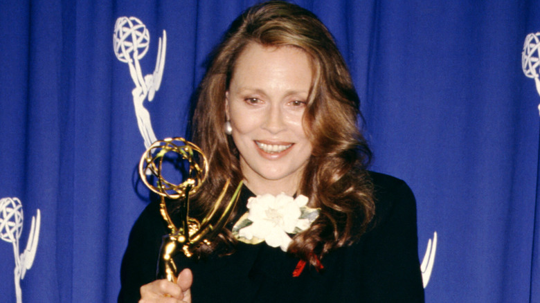 Faye Dunaway holding her Primetime Emmy