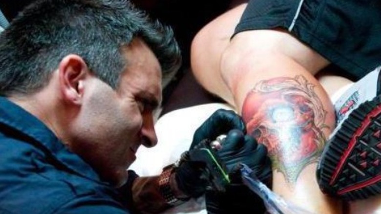 Shane O'Neill tattooing