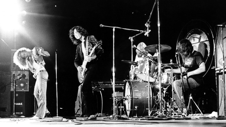 Led Zeppelin playing on stage
