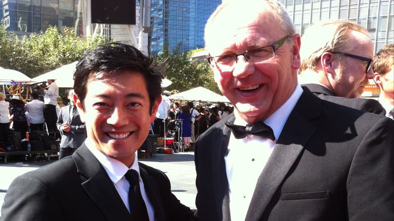 Grant Imahara and Robert Lee on red carpet smiling