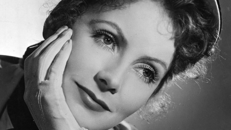 Greta Garbo with hand on face