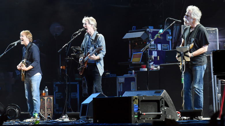 Trey Anastasio, Phil Lesh, and Bob Weir performing at Fare Thee Well concert