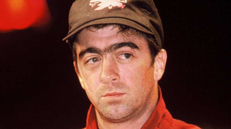 Bill Berry wearing ball cap