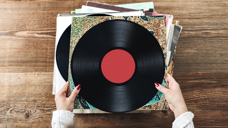 holding album