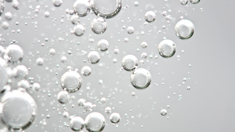 carbonation in clear liquid