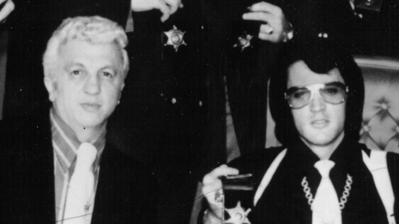 Dr. Nick and Elvis Presley posing for picture