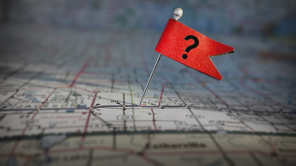 Question mark flag pin on map