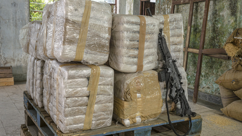 Packed drugs with machine gun