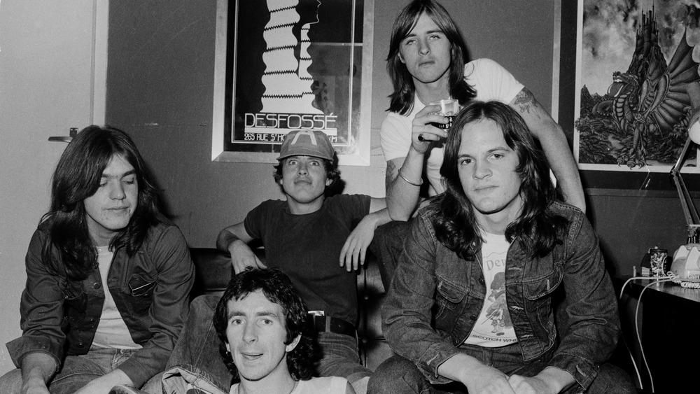 AC/DC members with mark evans