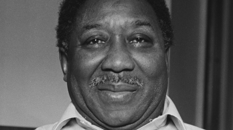 Muddy Waters smirking