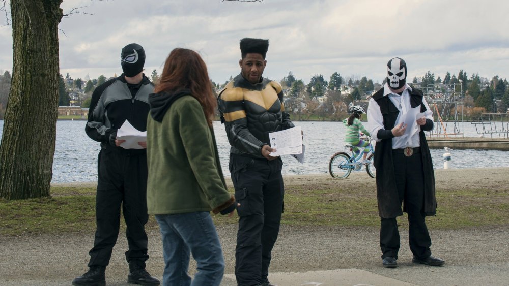 Phoenix Jones passing out warning flyers