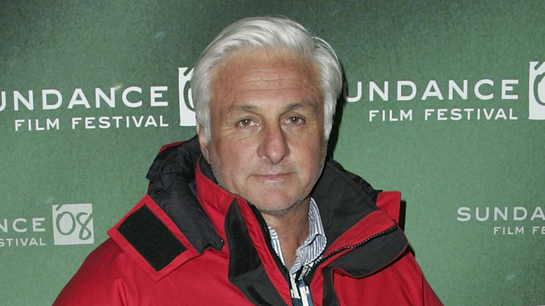 Roberto Canessa staring ahead red jacket