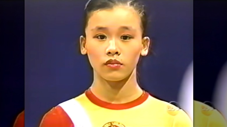 Sang Lan in gymnastic outfit