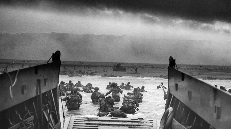 A landing craft disembarks troops at Omaha Beach on D-Day
