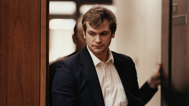 Jeffrey Dahmer suit walking through door