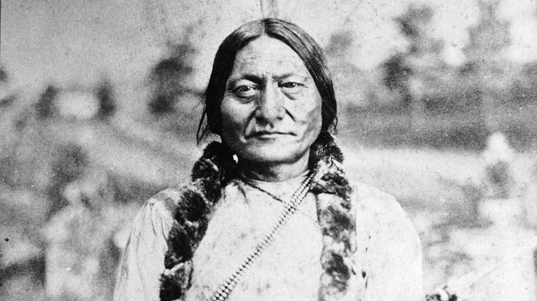 Sitting Bull sitting for a portrait