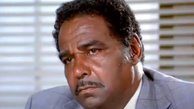 bernie hamilton suit head tilted