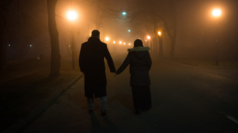 Couple walking at night