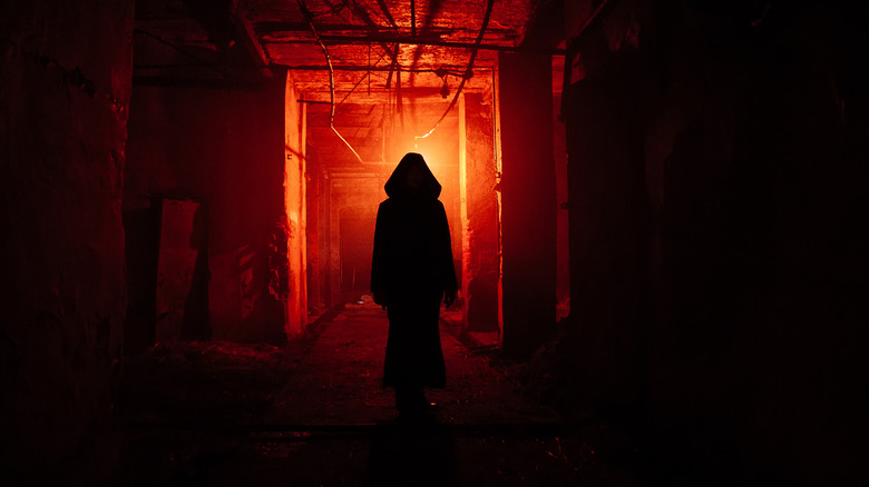Silhouette in red light