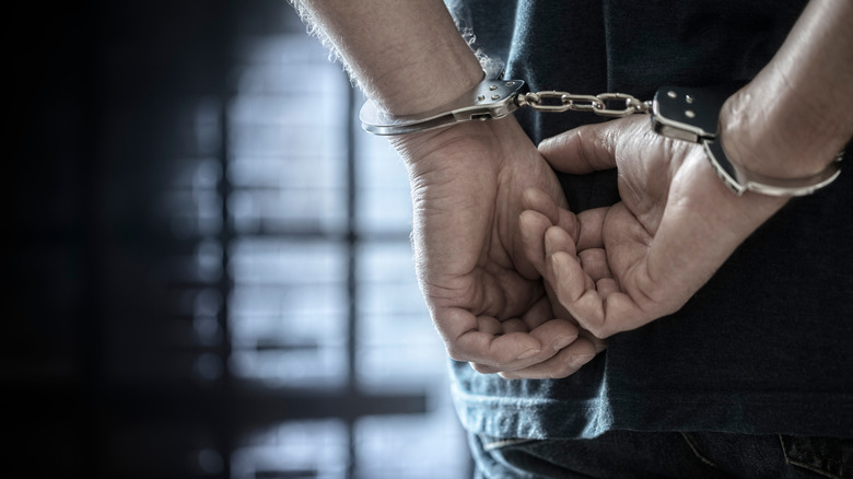 hands handcuffed