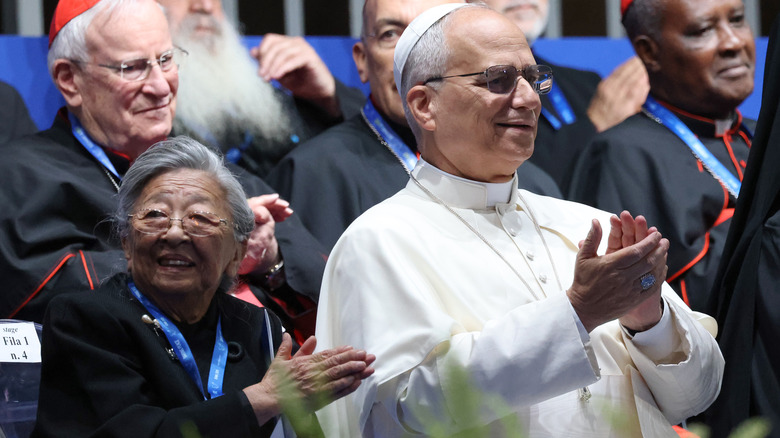 Koko Kondo sitting next to Pope Leo XIV