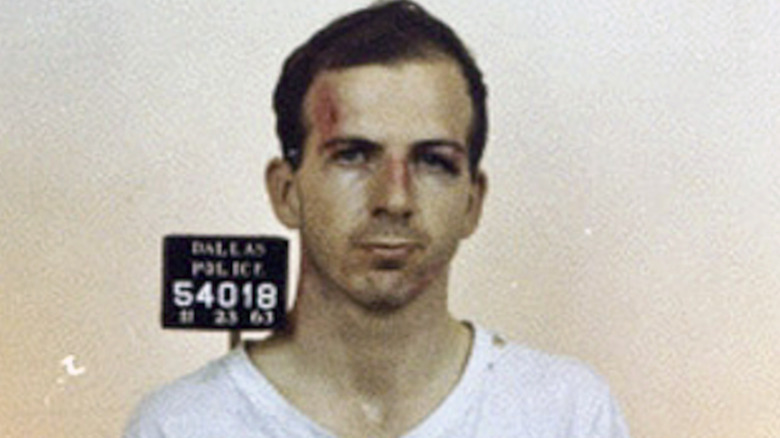 Lee Harvey Oswald poses 