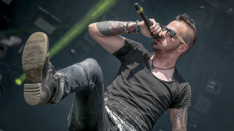 Adam Gontier performing on stage