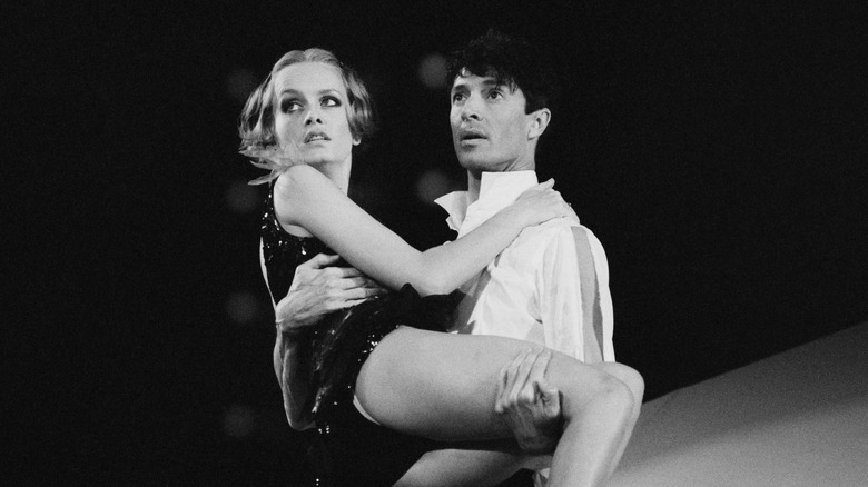 Twiggy in Tommy Tune's arms on stage