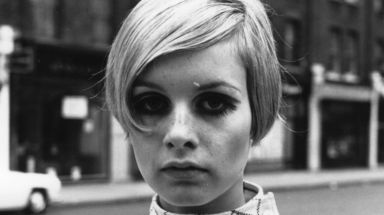 Twiggy on the street, posing