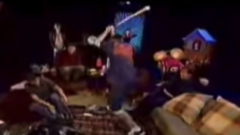 Vanilla Ice trashing a set