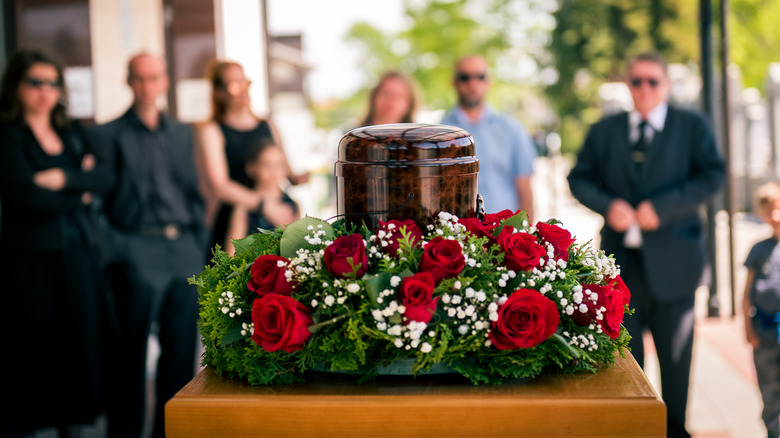 a funeral with urn
