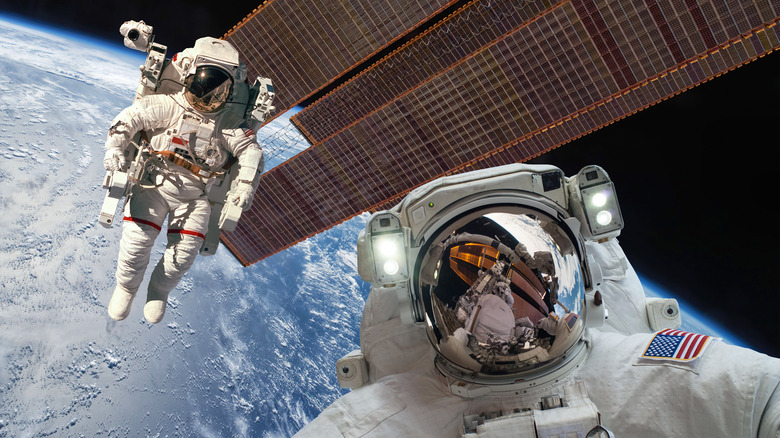 Astronauts outside International Space Station