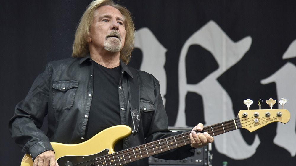 Geezer Butler playing bass