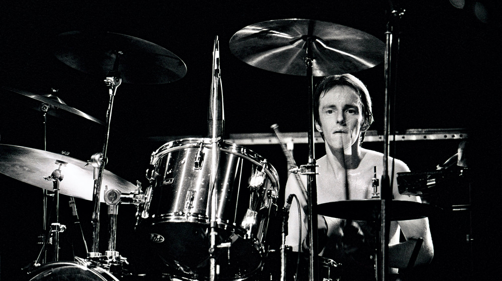 Topper Headon playing drums