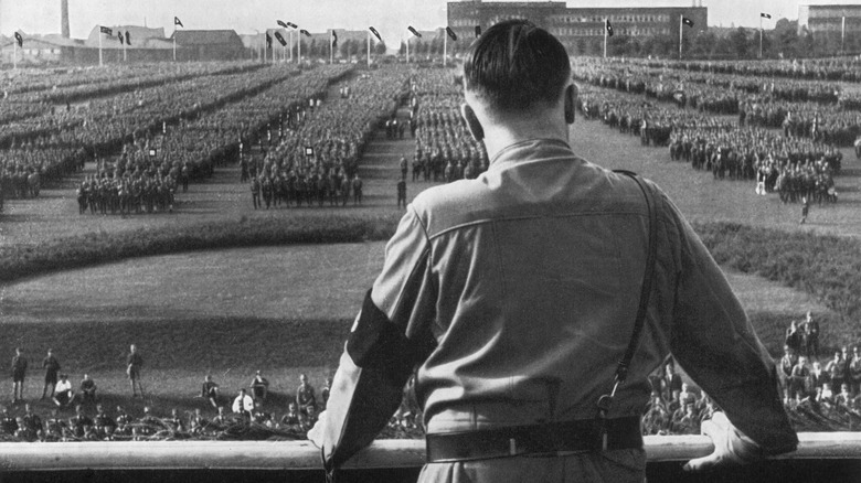Hitler makes speech to soldiers with back to camera