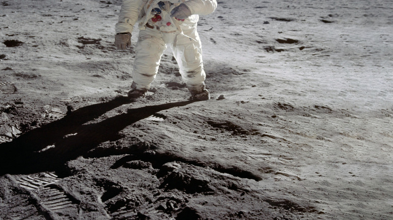 astronaut walking on the moon